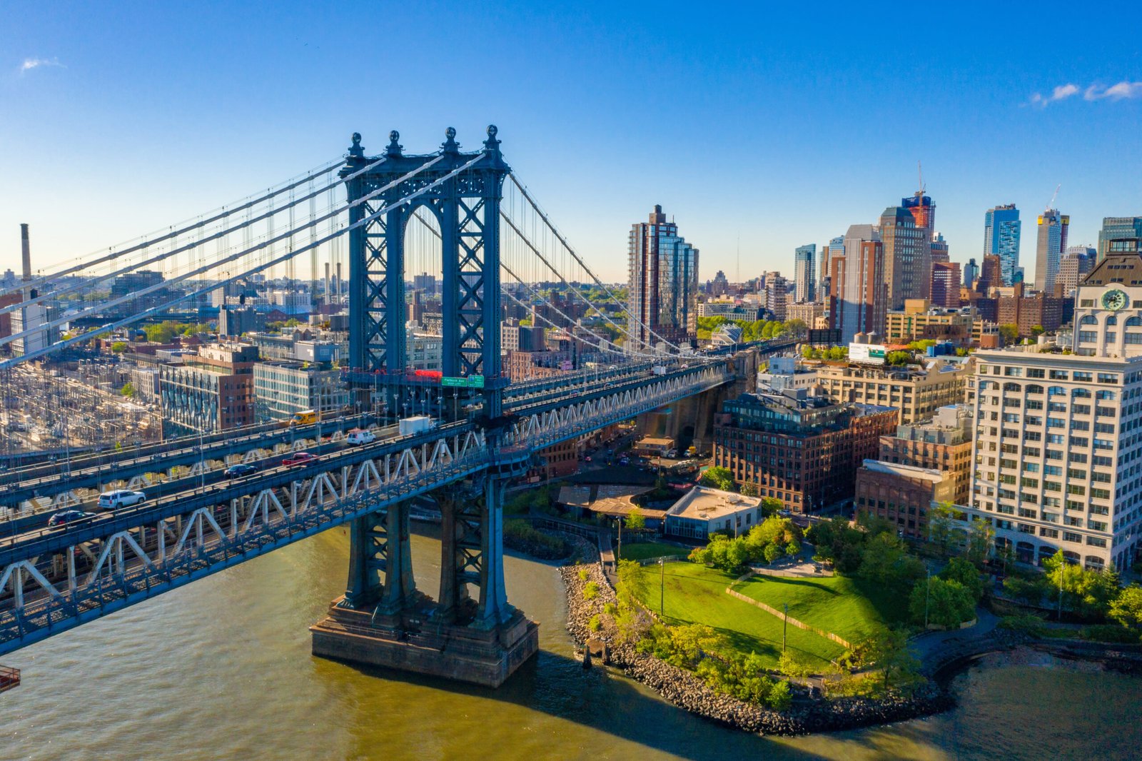 Manhattan Bridge and the New York City skyline at dusk